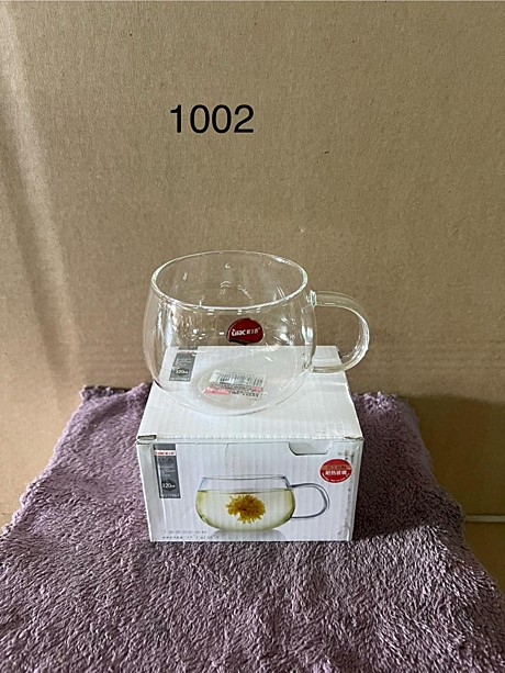 1002 Прозрачная стеклянная стакан с ручкой